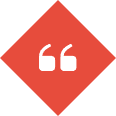 Red diamond with white quotation marks.